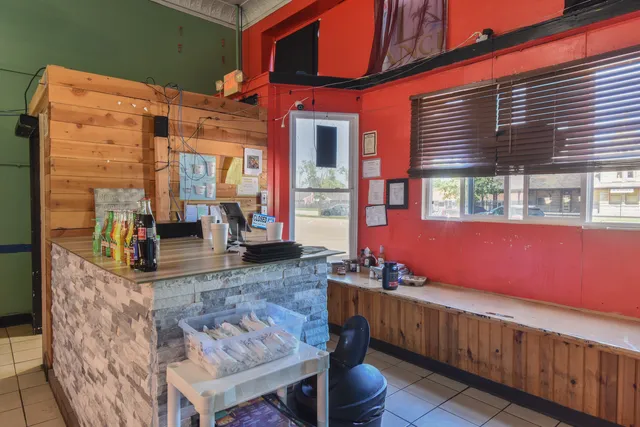 a kitchen with stainless steel appliances granite countertop a sink and cabinets