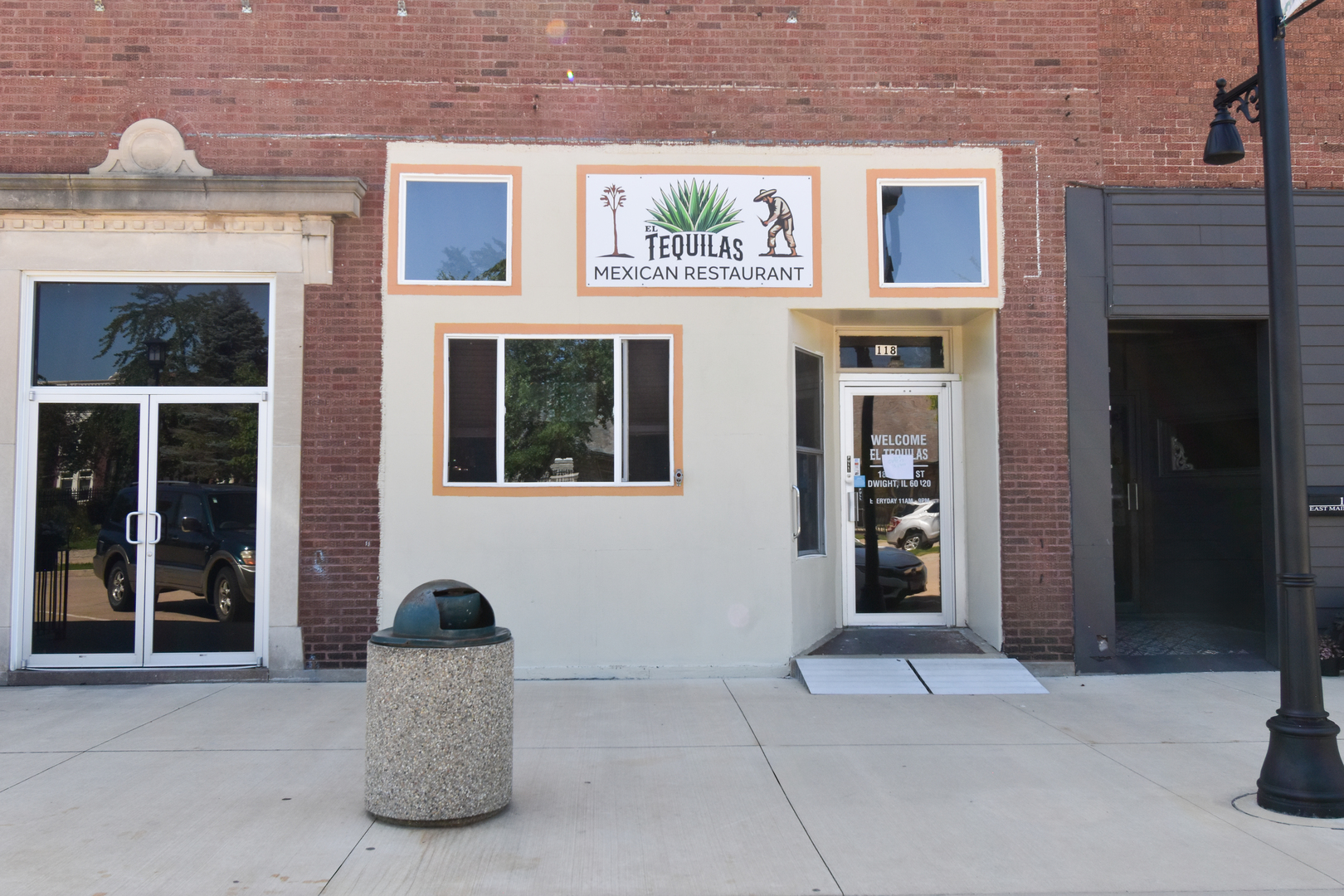 118 East Main Street Dwight, IL 60420 - Photo 2 of 77 a view of a building with a door and windows