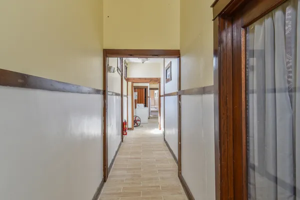 a bathroom with a bathtub and a window