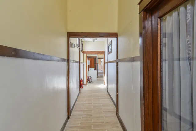 a bathroom with a bathtub and a window