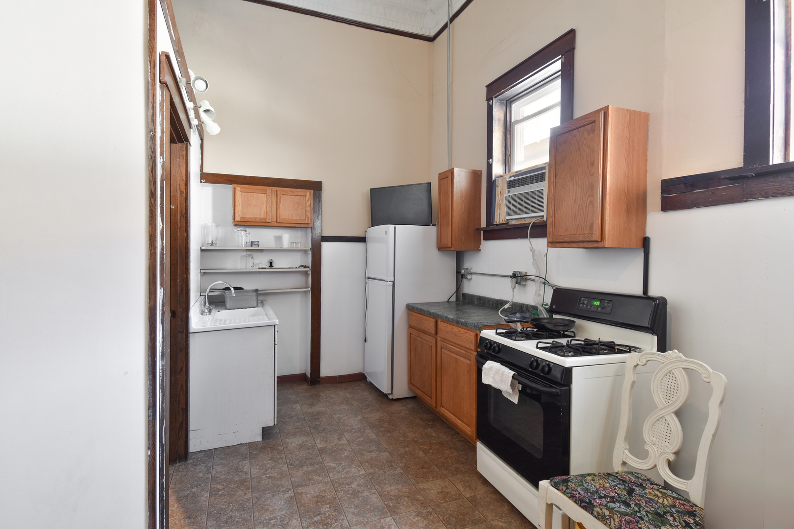 118 East Main Street Dwight, IL 60420 - Photo 55 of 77 a kitchen with a refrigerator stove and sink