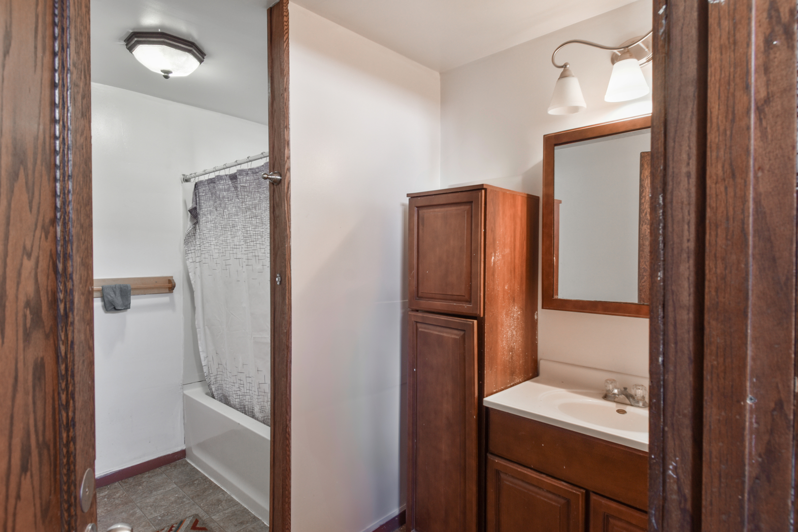 118 East Main Street Dwight, IL 60420 - Photo 56 of 77 a bathroom with a sink a toilet and shower
