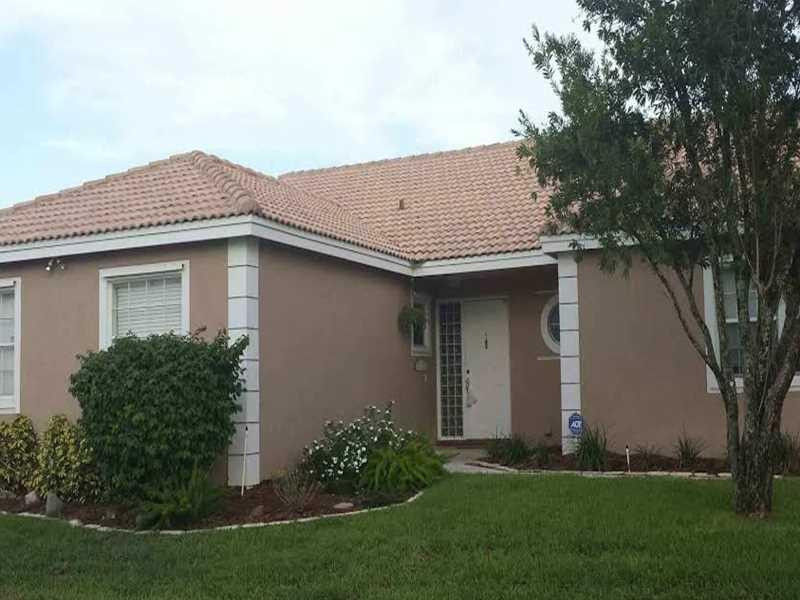 9699 Tavernier Drive Boca Raton, FL 33496 - Photo 1 of 23 Exterior Front