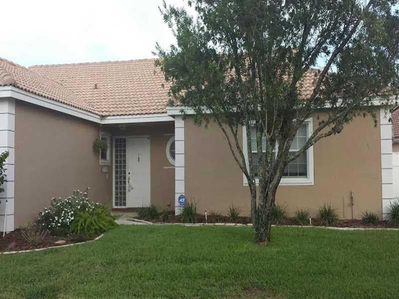 9699 Tavernier Drive Boca Raton, FL 33496 - Photo 2 of 23 Exterior Front