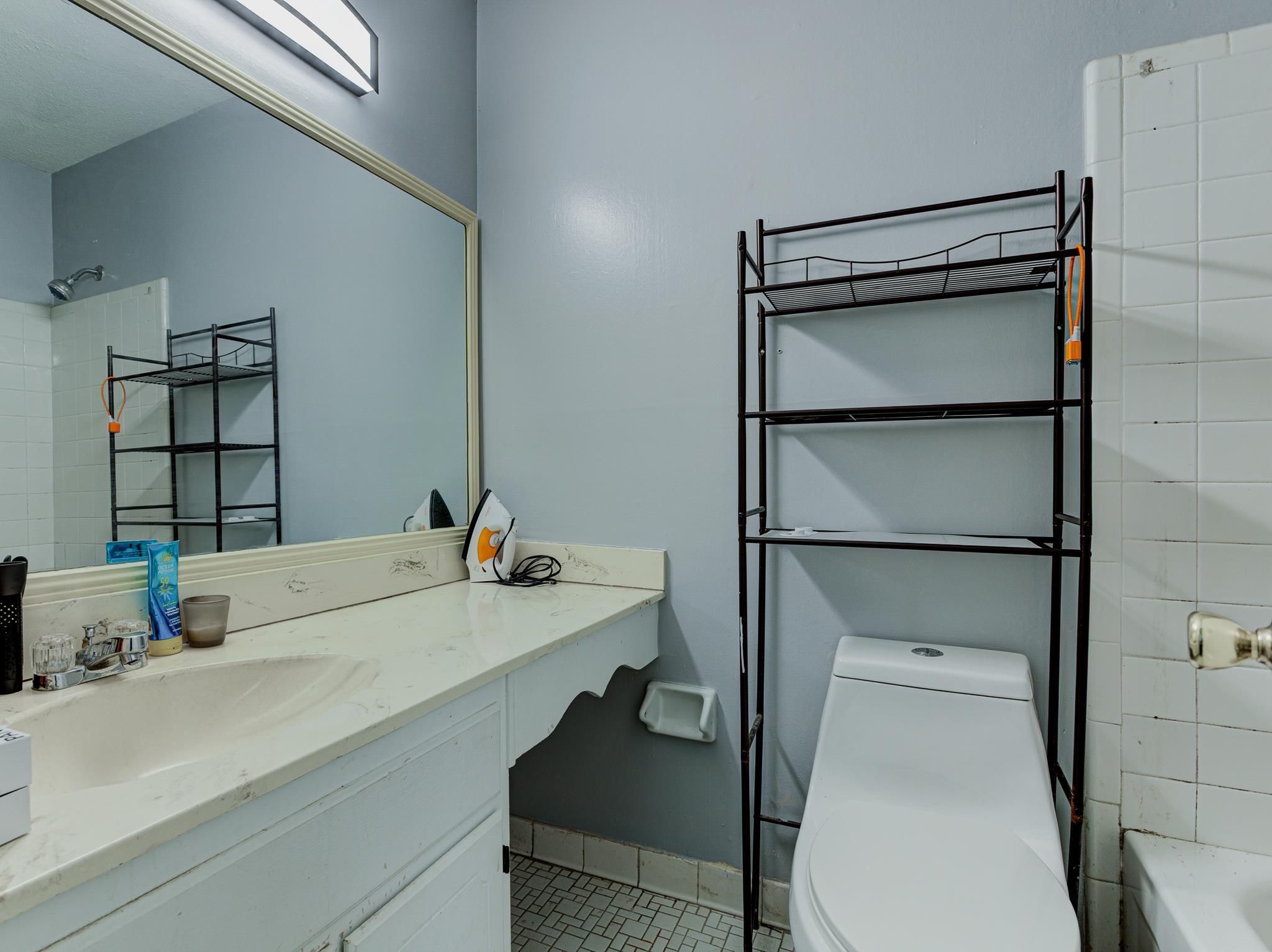 6044 Raintree Drive Memphis, TN 38115 - Photo 15 of 22 Bathroom featuring tile patterned floors and vanity