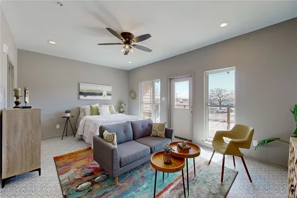 a living room with furniture and a table