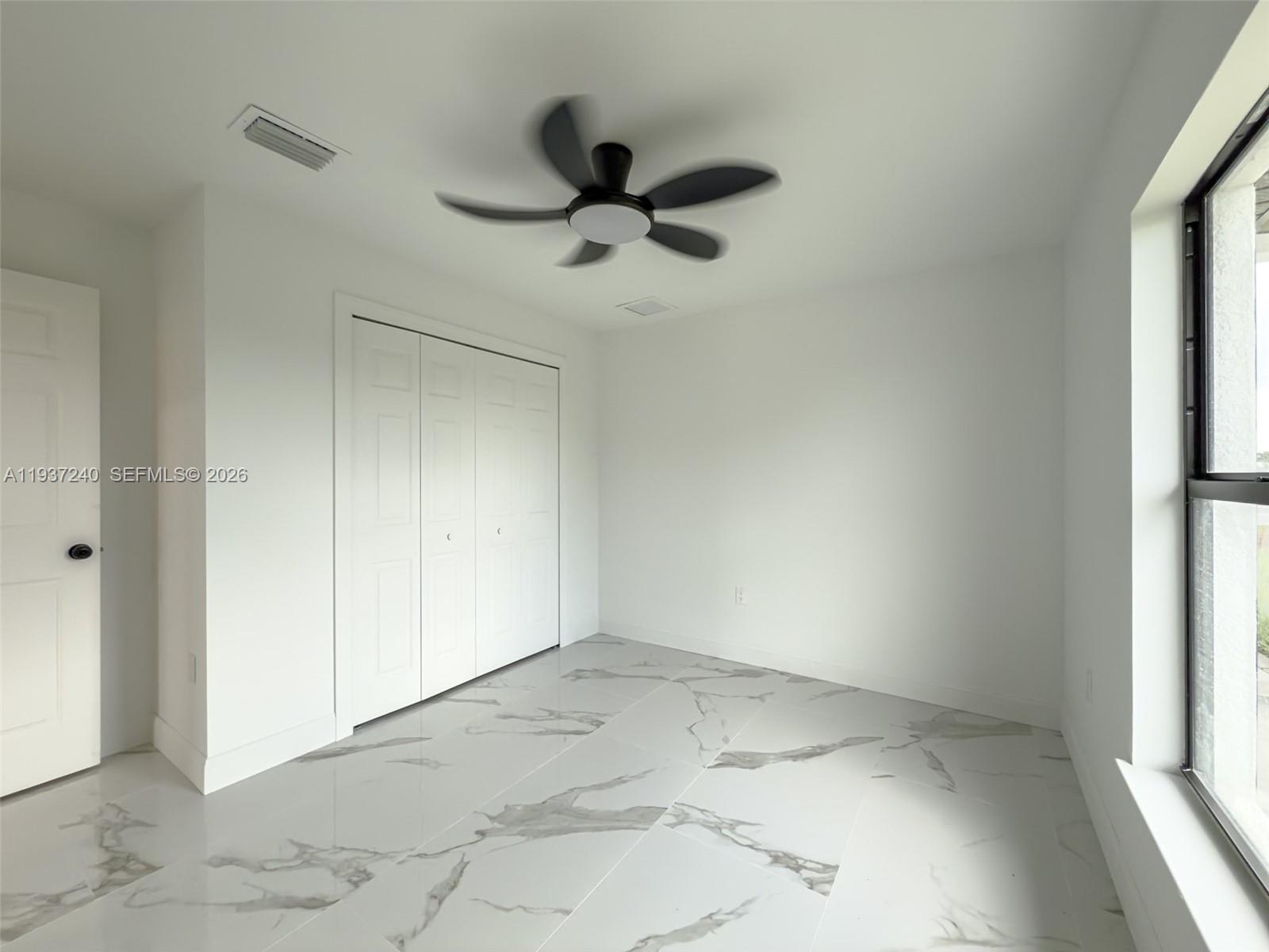 842-844 Alabama Road South Lehigh Acres, FL 33974 - Photo 29 of 40 a view of an empty room