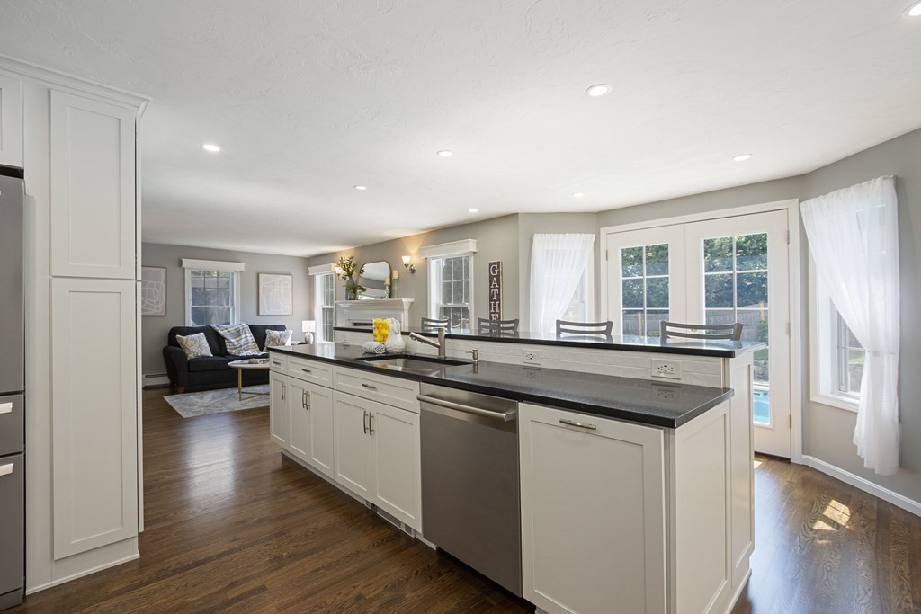 23 Taft Avenue Maynard, MA 01754 - Photo 13 of 42 a kitchen with counter top space and wooden floor