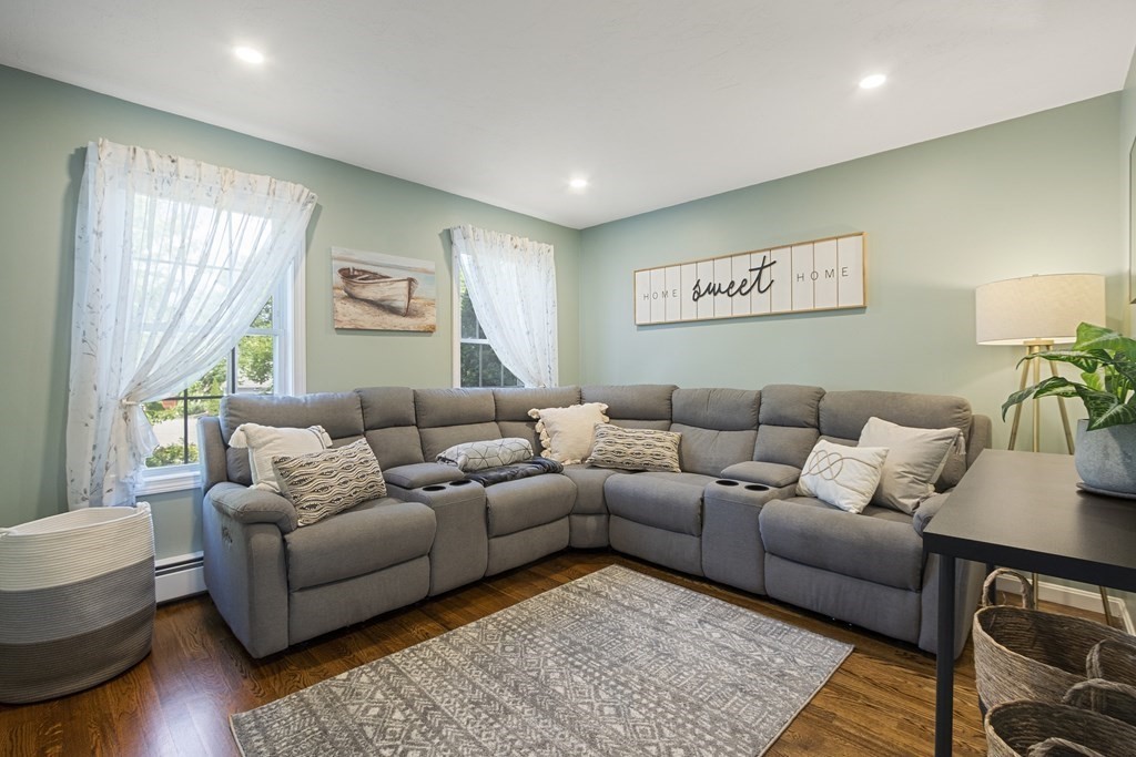 23 Taft Avenue Maynard, MA 01754 - Photo 14 of 42 a living room with furniture and a large window