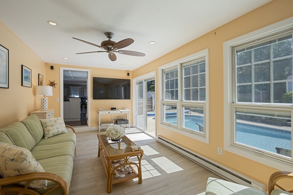 23 Taft Avenue Maynard, MA 01754 - Photo 19 of 42 a living room with furniture ceiling fan and window