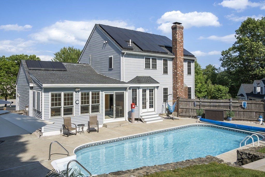 23 Taft Avenue Maynard, MA 01754 - Photo 2 of 42 a view of a house with swimming pool and porch