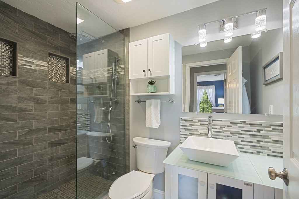 23 Taft Avenue Maynard, MA 01754 - Photo 27 of 42 a bathroom with a toilet sink and shower