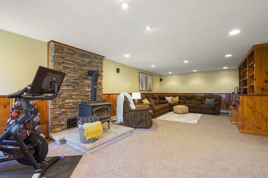 23 Taft Avenue Maynard, MA 01754 - Photo 30 of 42 a living room with furniture and a flat screen tv