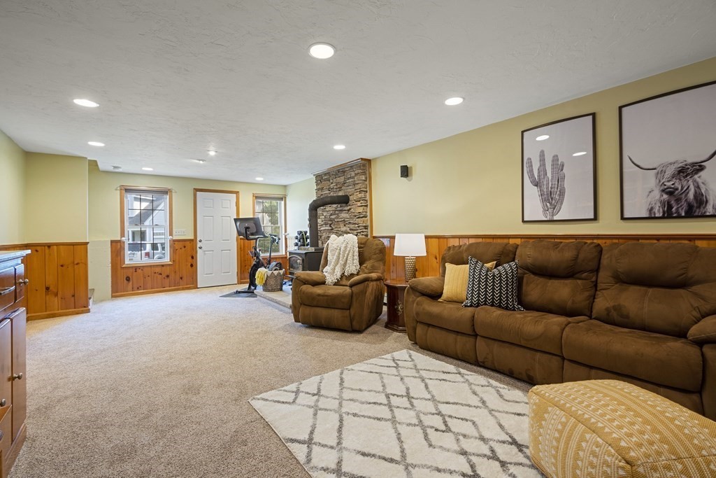 23 Taft Avenue Maynard, MA 01754 - Photo 31 of 42 a living room with furniture and wooden floor