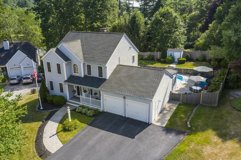 23 Taft Avenue Maynard, MA 01754 - Photo 38 of 42 a aerial view of a house with swimming pool garden and patio