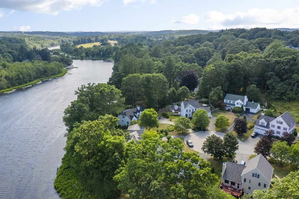 23 Taft Avenue Maynard, MA 01754 - Photo 39 of 42 an aerial view of lake residential house with outdoor space and trees all around