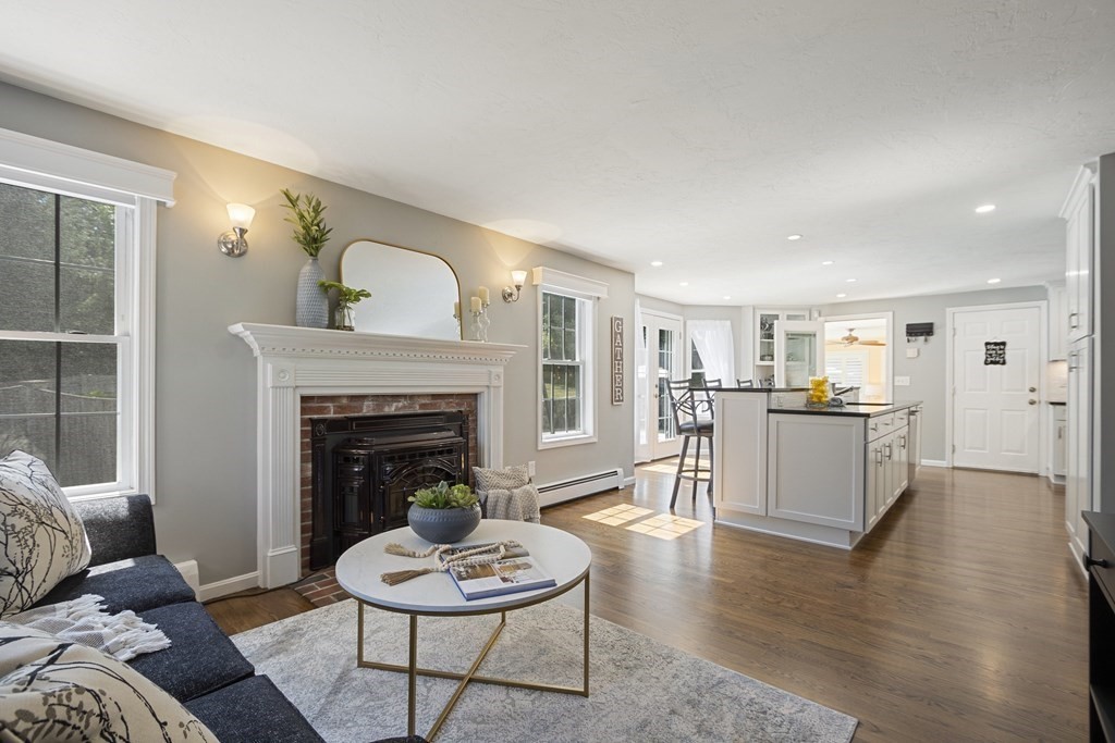 23 Taft Avenue Maynard, MA 01754 - Photo 5 of 42 a living room with furniture and a fireplace