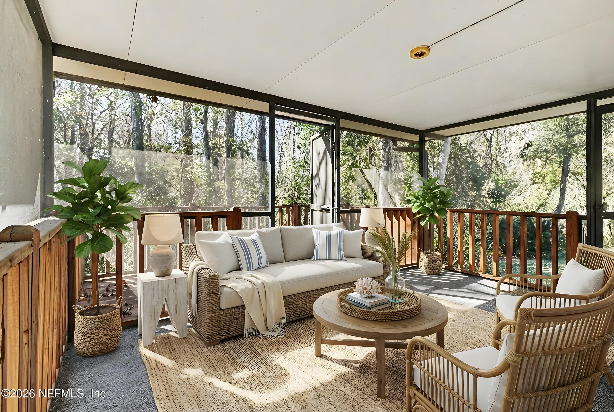 11958 Swooping Willow Road Jacksonville, FL 32223 - Photo 27 of 31 a living room with furniture and a large window