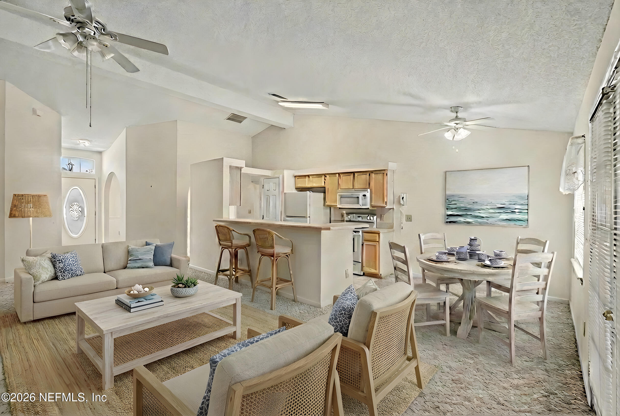 11958 Swooping Willow Road Jacksonville, FL 32223 - Photo 7 of 31 a view of a a dining room with furniture window and wooden floor