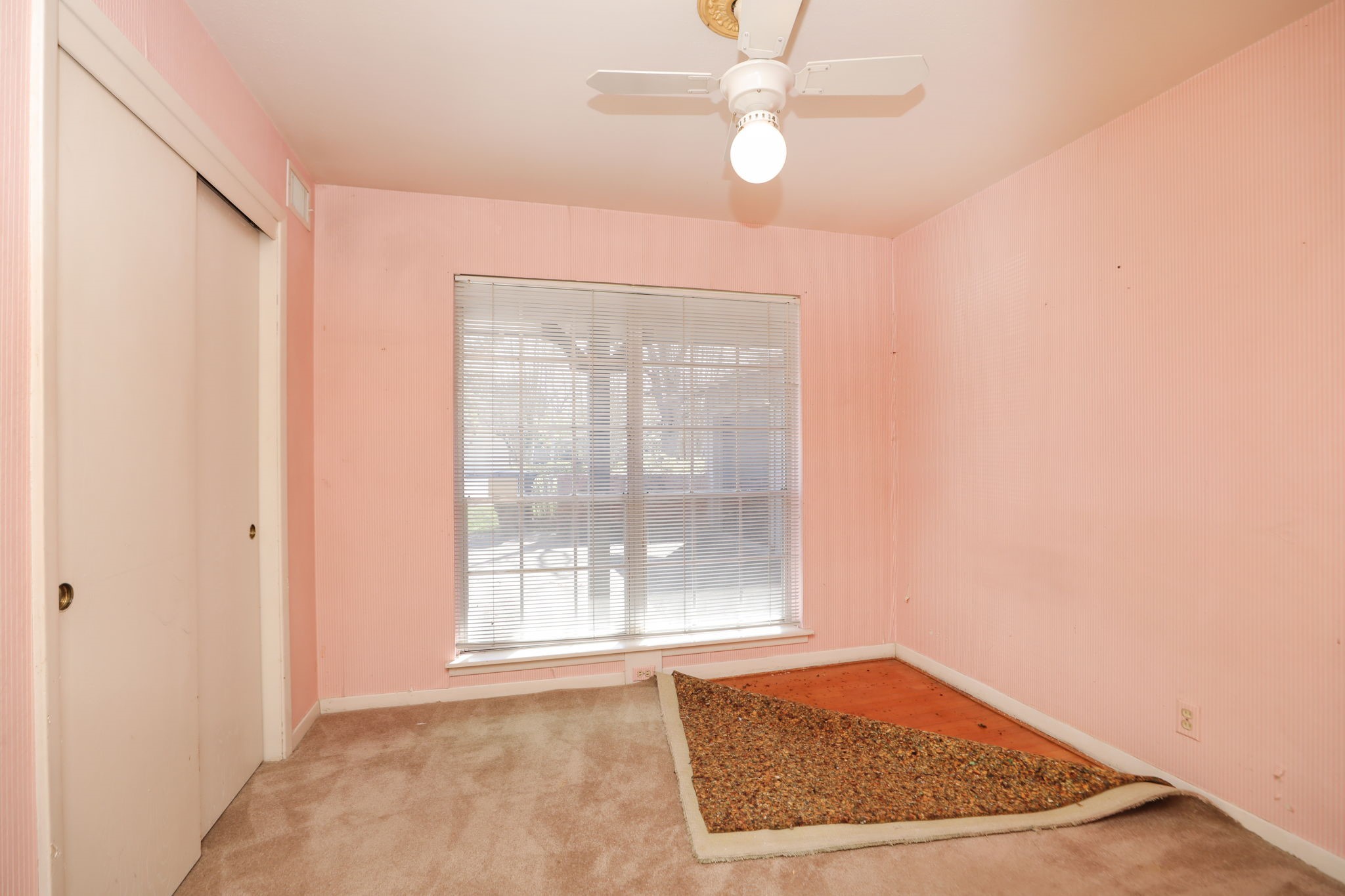 7158 Sharpview Drive Houston, TX 77074 - Photo 21 of 35 a view of an empty room with a window