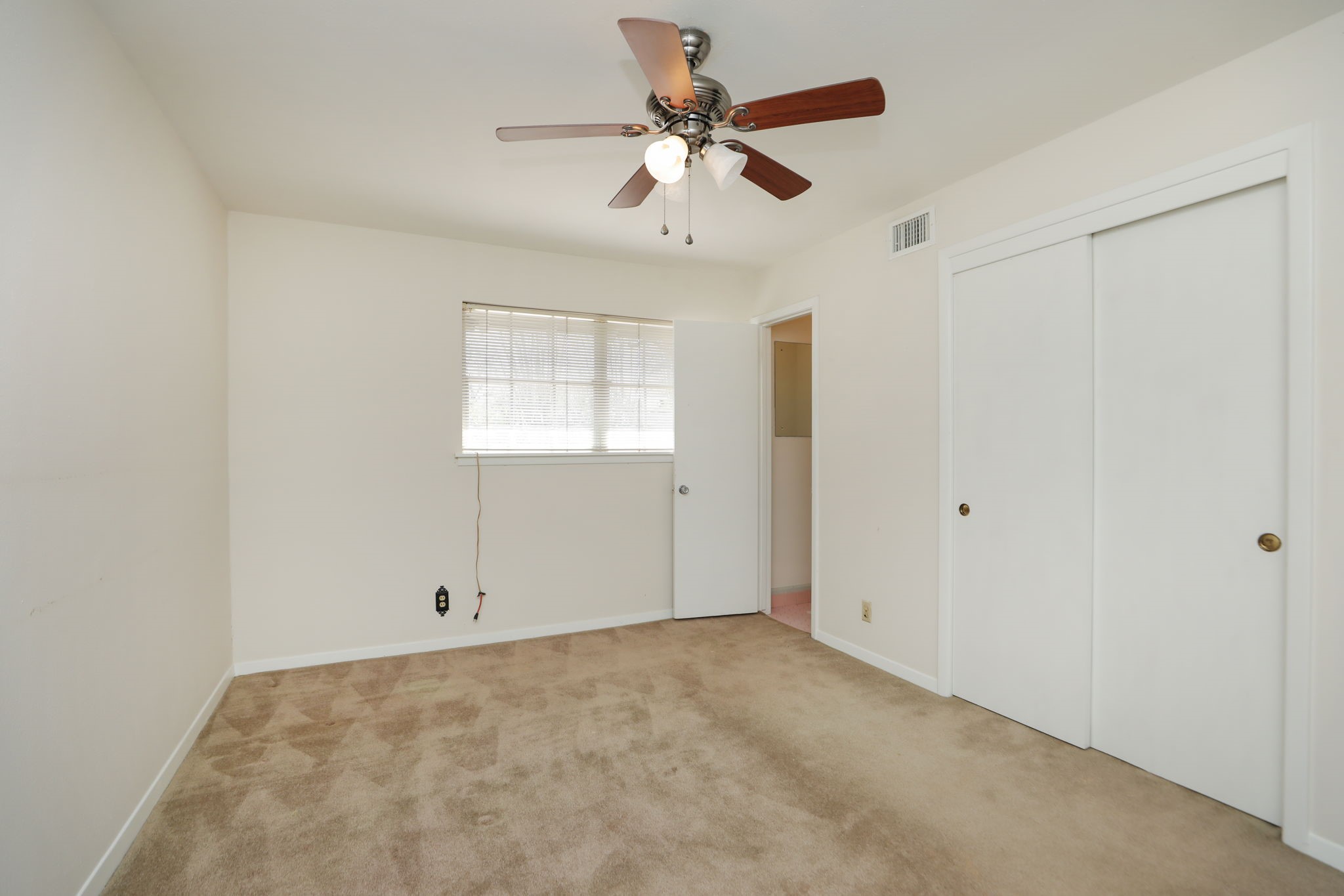 7158 Sharpview Drive Houston, TX 77074 - Photo 23 of 35 a view of an empty room with a window