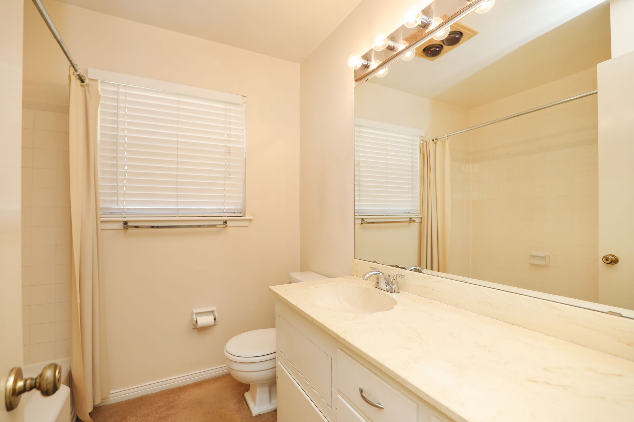 7158 Sharpview Drive Houston, TX 77074 - Photo 29 of 35 a bathroom with a granite countertop sink toilet and shower