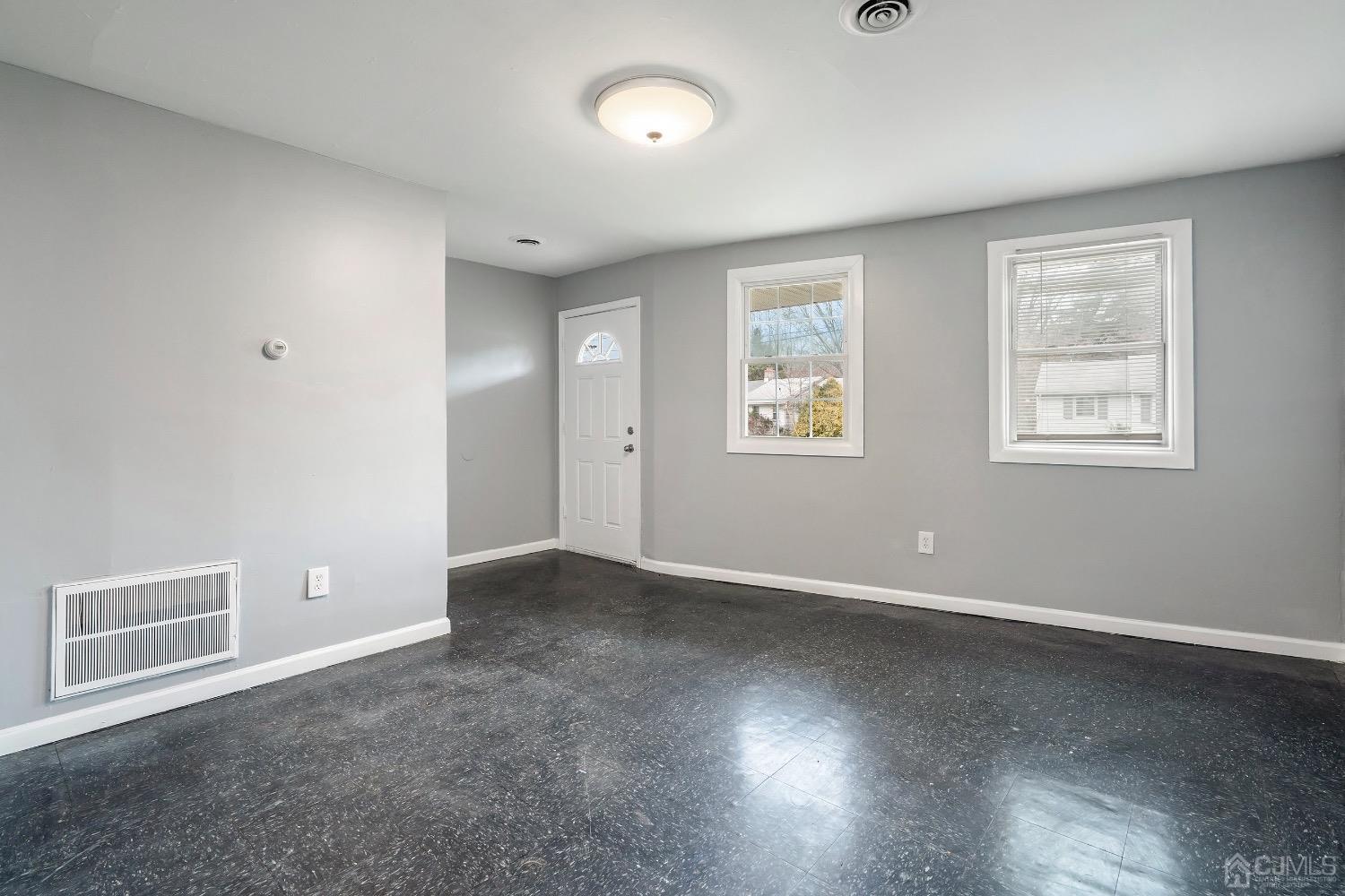 211 Kinsley Road Pemberton, NJ 08068 - Photo 3 of 15 an empty room with windows and closet