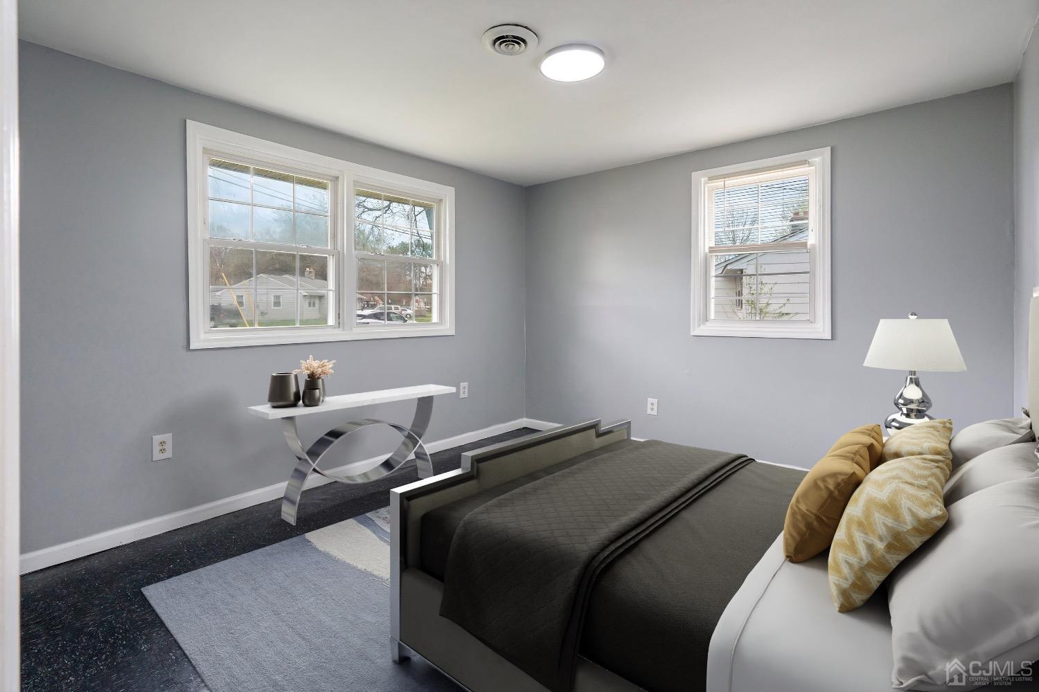 211 Kinsley Road Pemberton, NJ 08068 - Photo 5 of 15 a bedroom with a bed and wooden floor