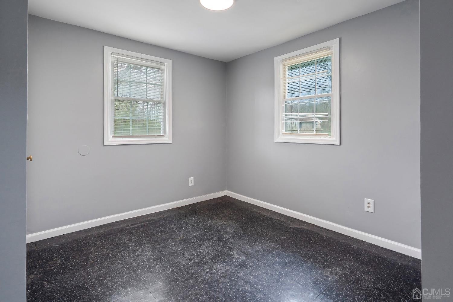211 Kinsley Road Pemberton, NJ 08068 - Photo 7 of 15 an empty room with windows