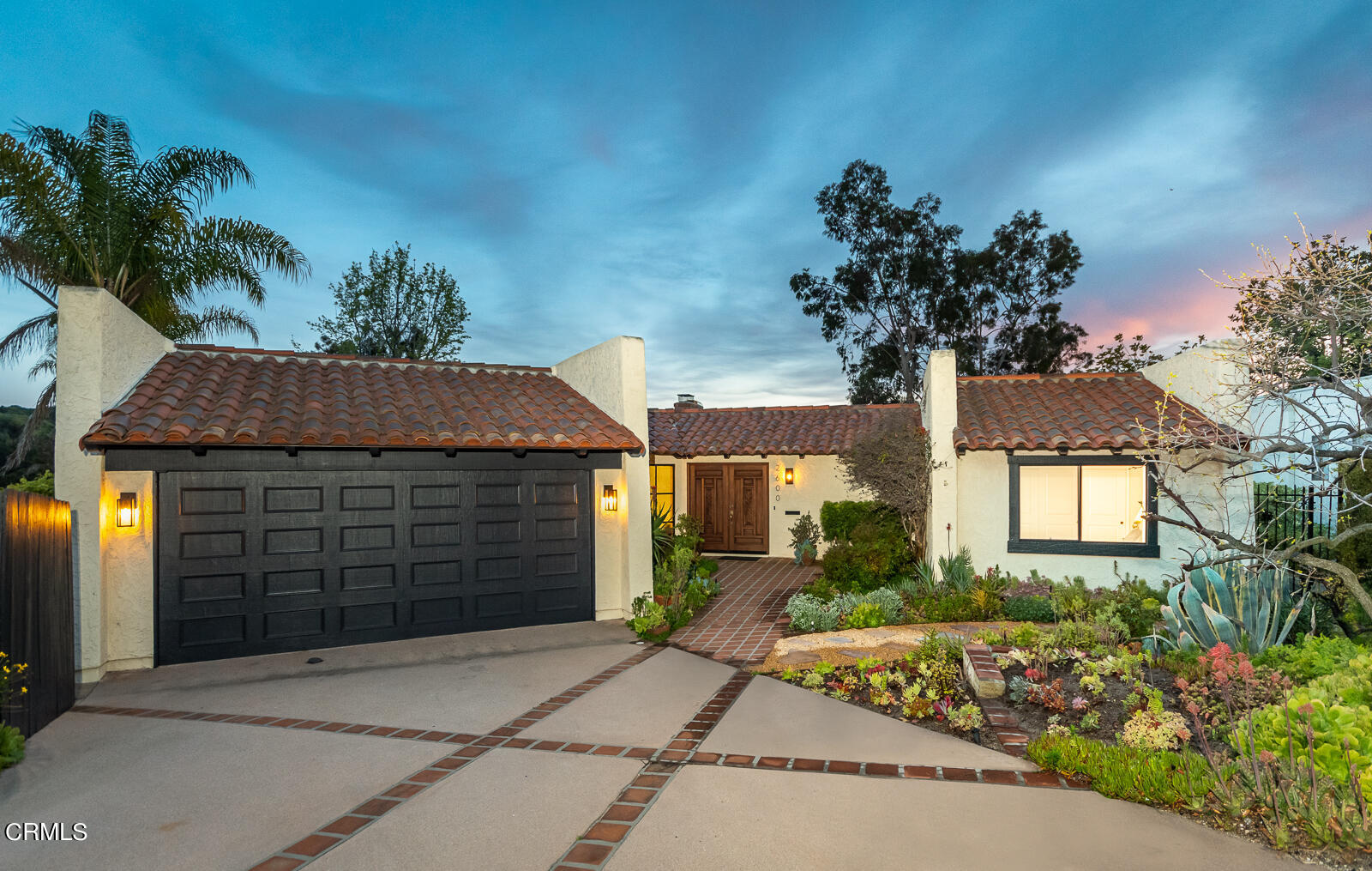 2600 Perkins Glendale, CA 91206 - Photo 2 of 34 a front view of a house with a yard and a garage