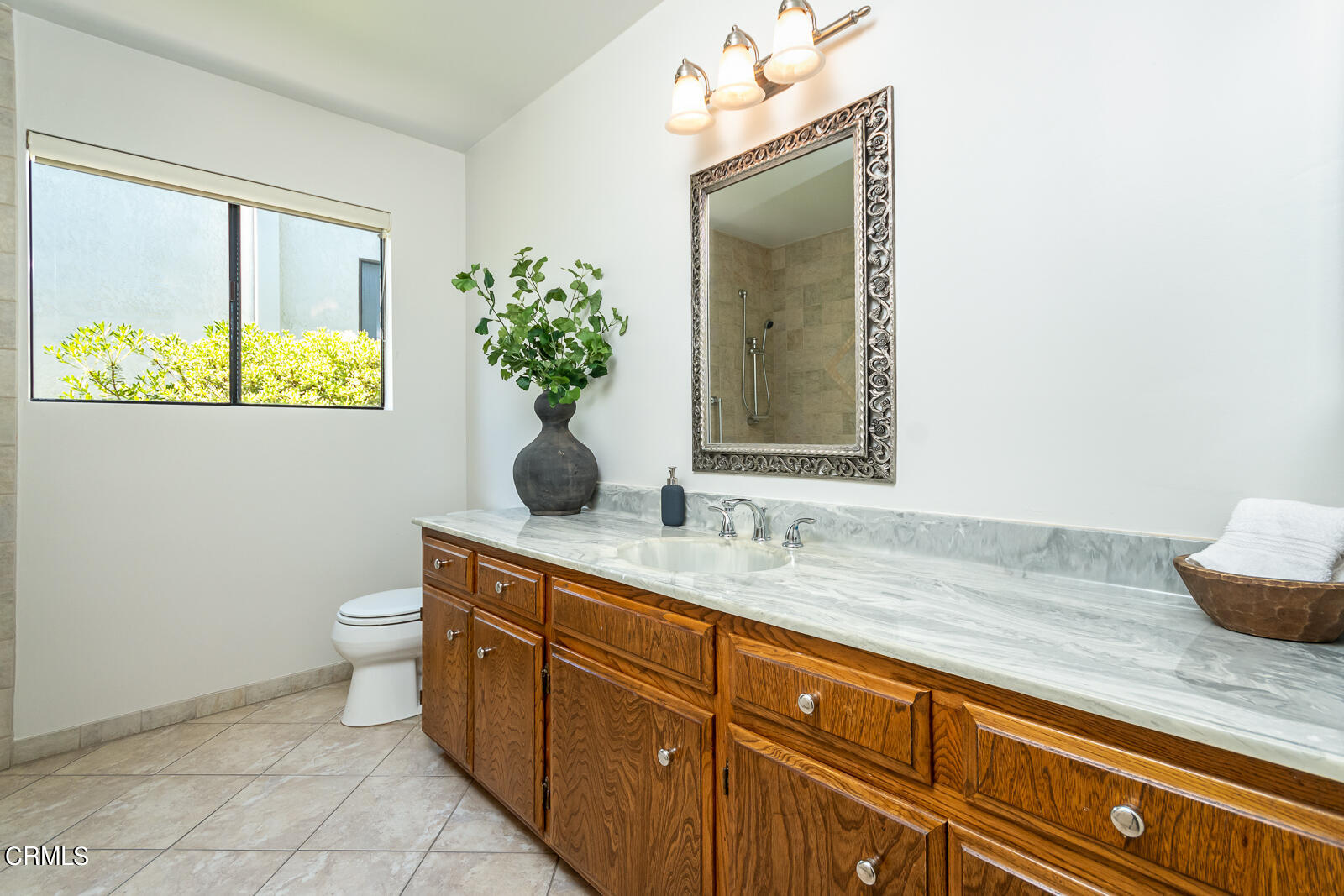 2600 Perkins Glendale, CA 91206 - Photo 25 of 34 a bathroom with a granite countertop toilet sink and mirror