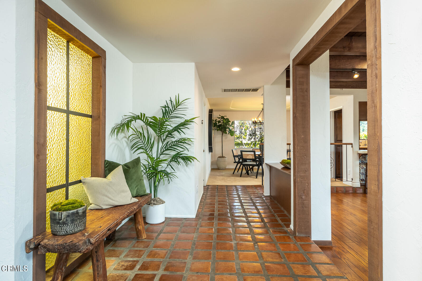 2600 Perkins Glendale, CA 91206 - Photo 4 of 34 a hallway with a dining table and a couches with wooden floor