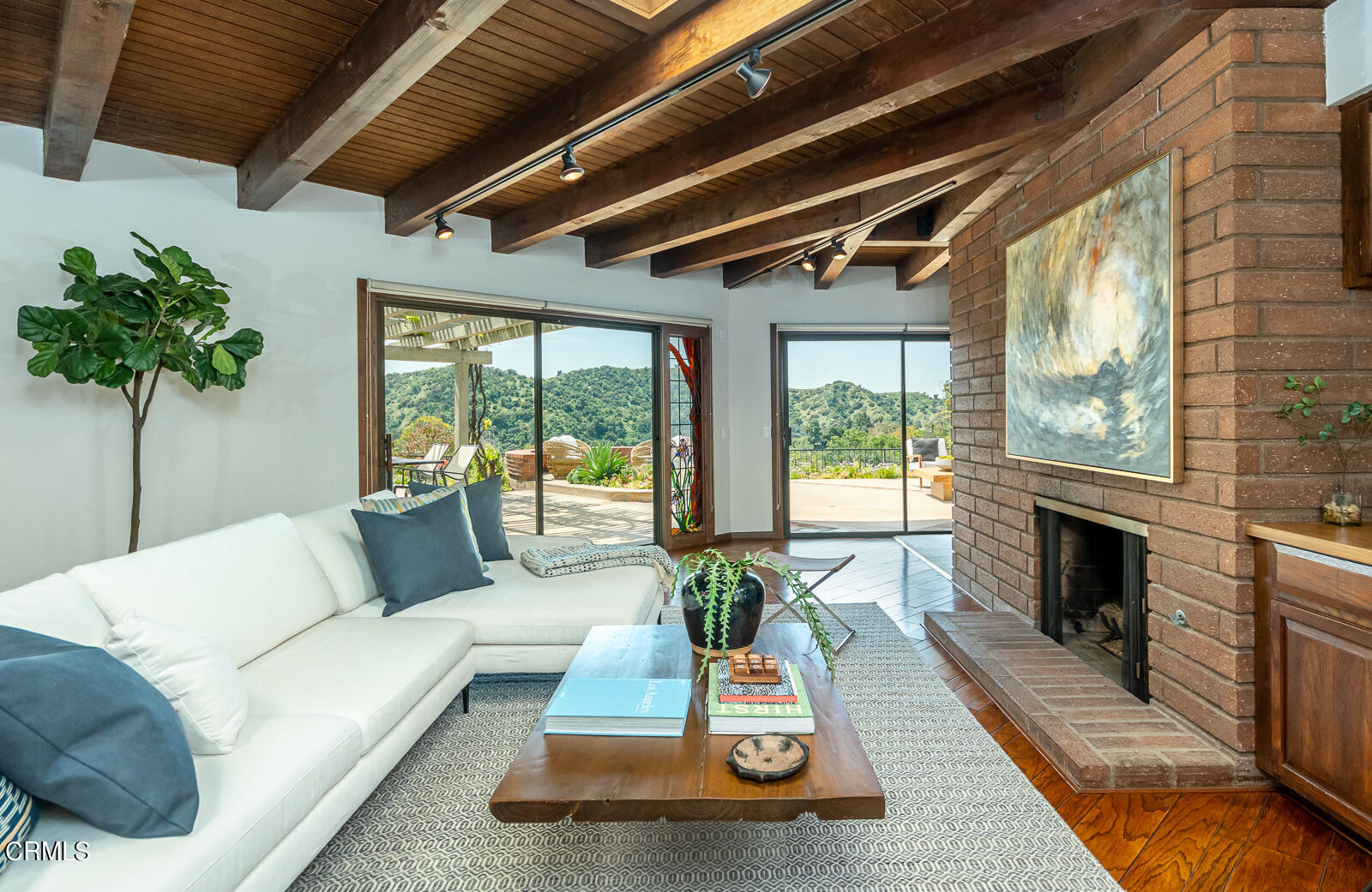 2600 Perkins Glendale, CA 91206 - Photo 9 of 34 a living room with furniture large window and a fireplace