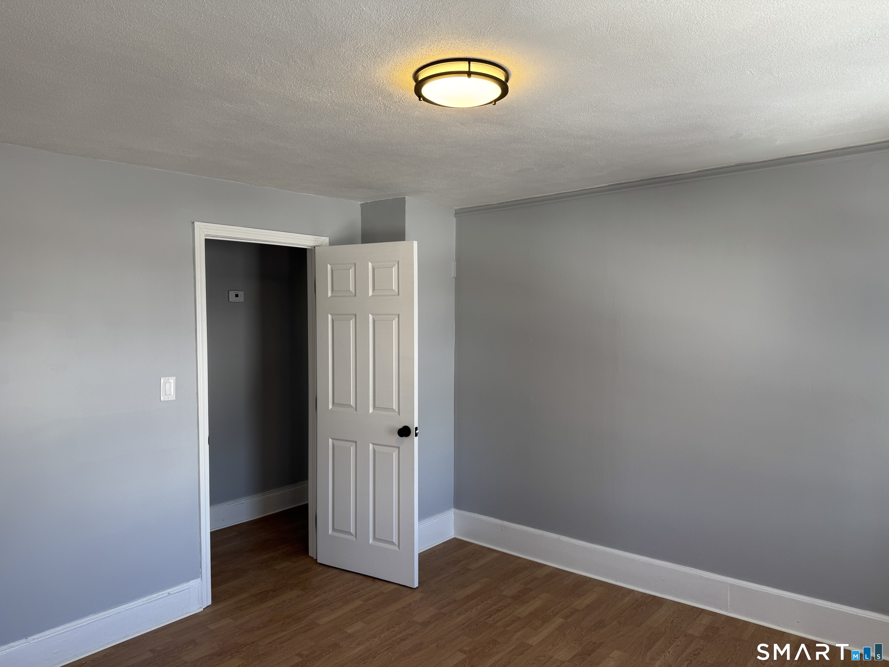 299 Linnmoore Street Hartford, CT 06106 - Photo 11 of 23 a view of a room with wooden floor