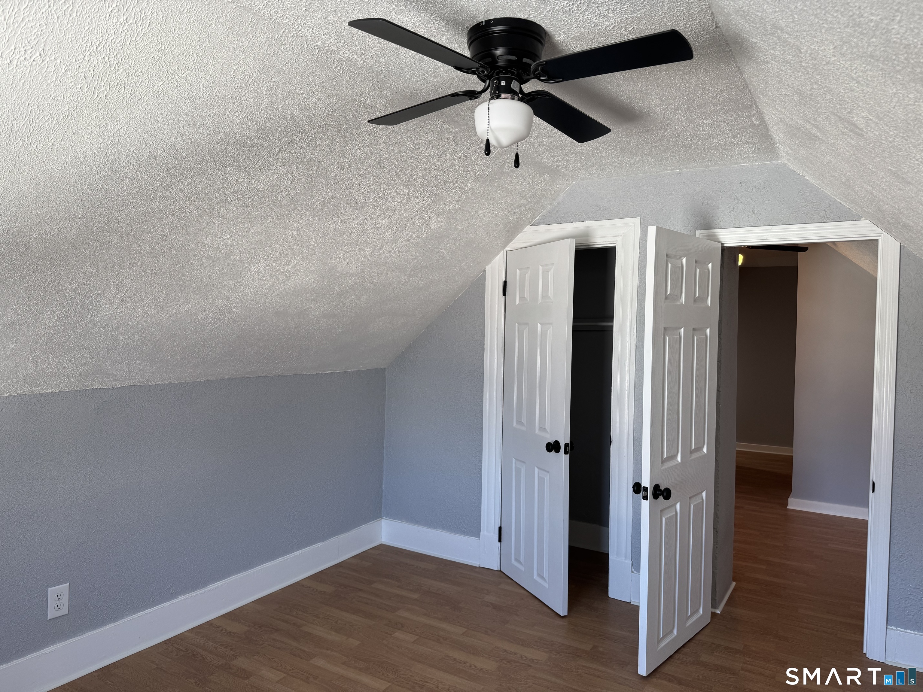 299 Linnmoore Street Hartford, CT 06106 - Photo 15 of 23 wooden floor in an empty room