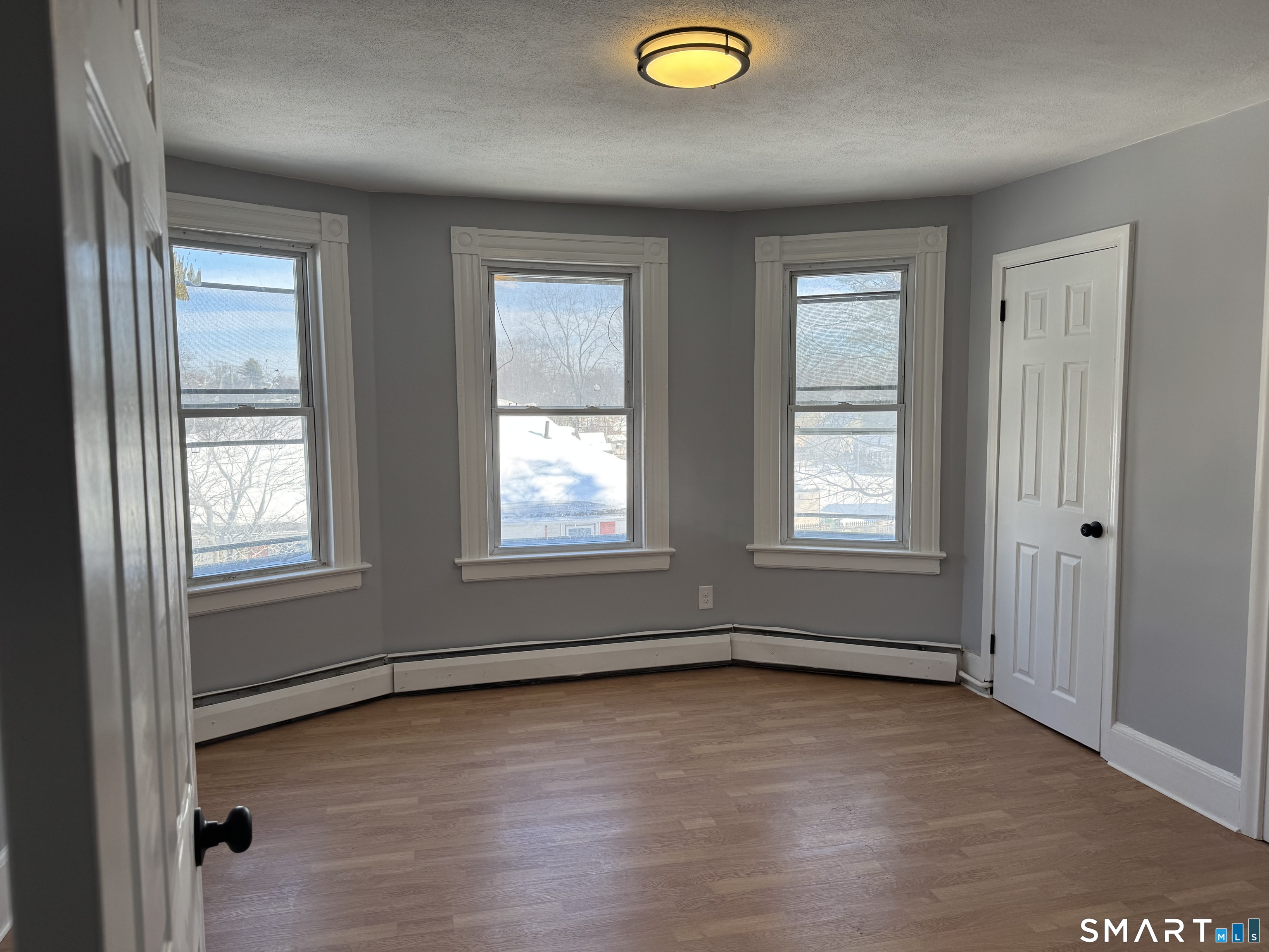 299 Linnmoore Street Hartford, CT 06106 - Photo 9 of 23 a view of an empty room and window
