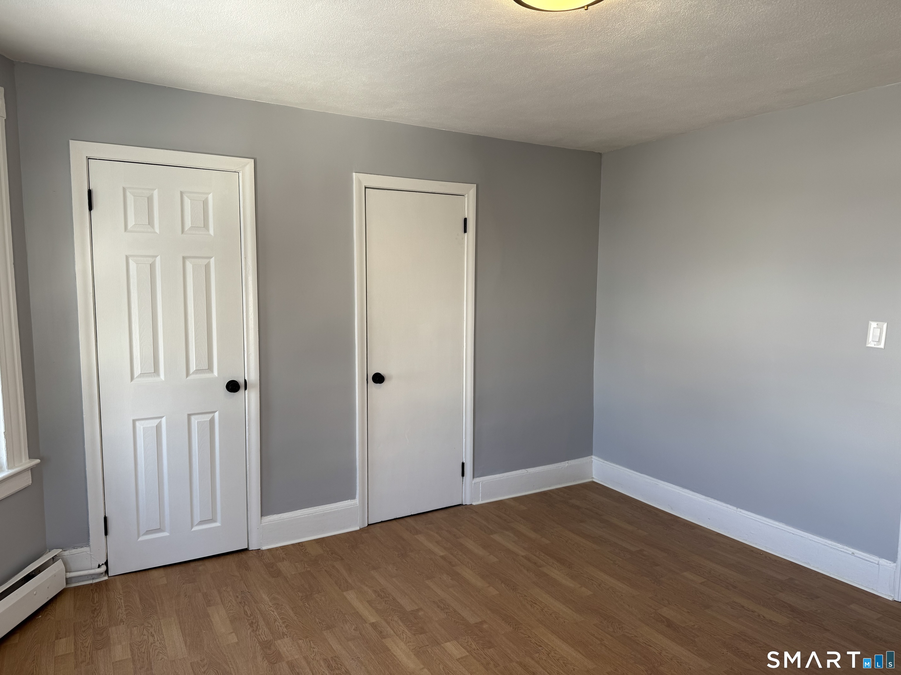 299 Linnmoore Street Hartford, CT 06106 - Photo 10 of 23 a view of an empty room with closet area