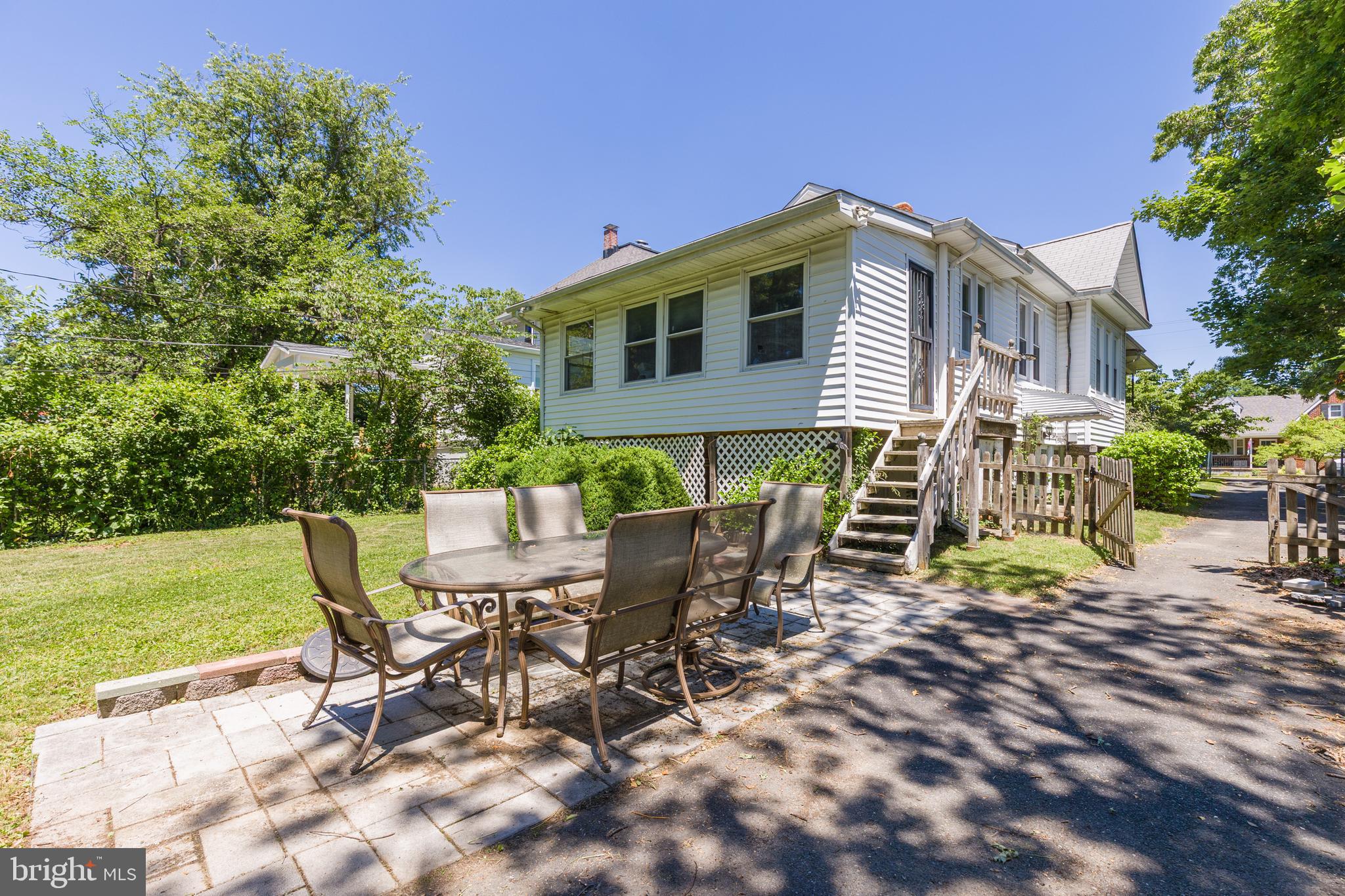 6426 Sherwood Road Baltimore, MD 21239 - Photo 43 of 43 a view of a house with backyard and sitting area