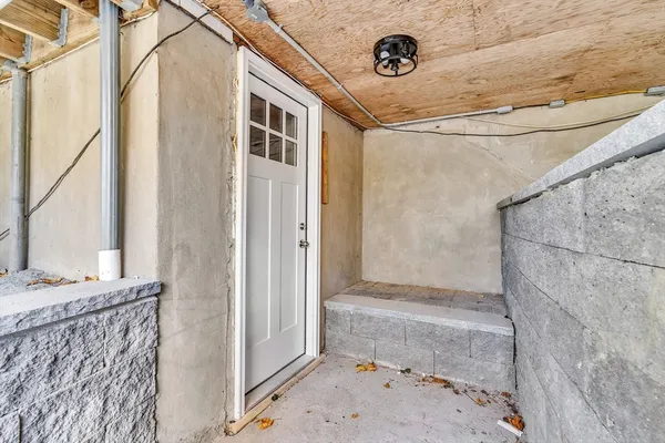 a bathroom with a tub and shower