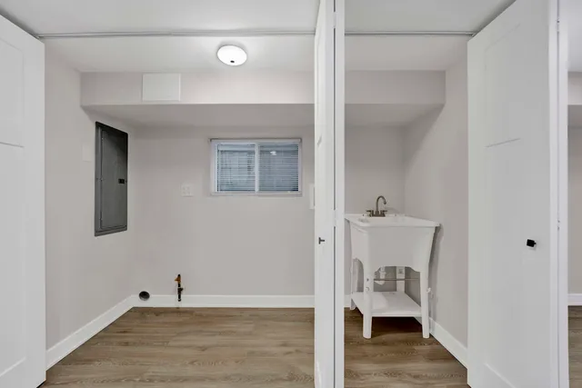 a view of a room that has a bench in it