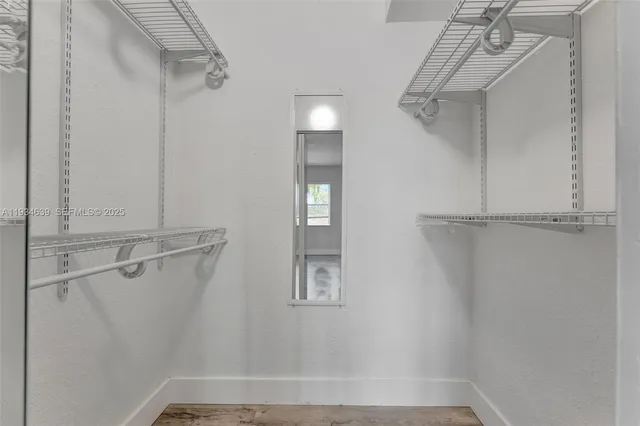 a view of a walk in closet