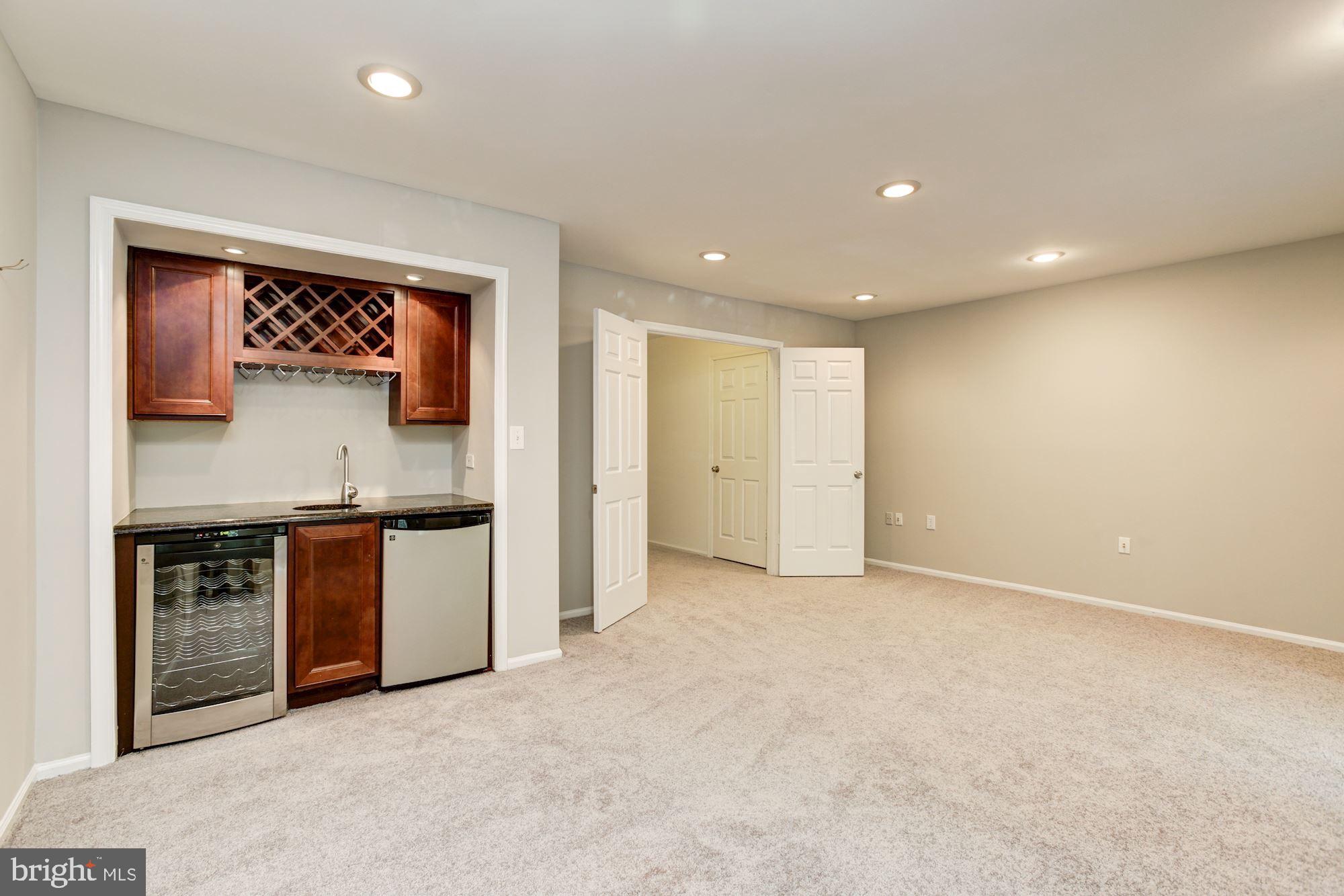 7531 Swan Point Way, Unit 192 Columbia, MD 21045 - Photo 24 of 35 Rec room has wet bar and beverage cooler