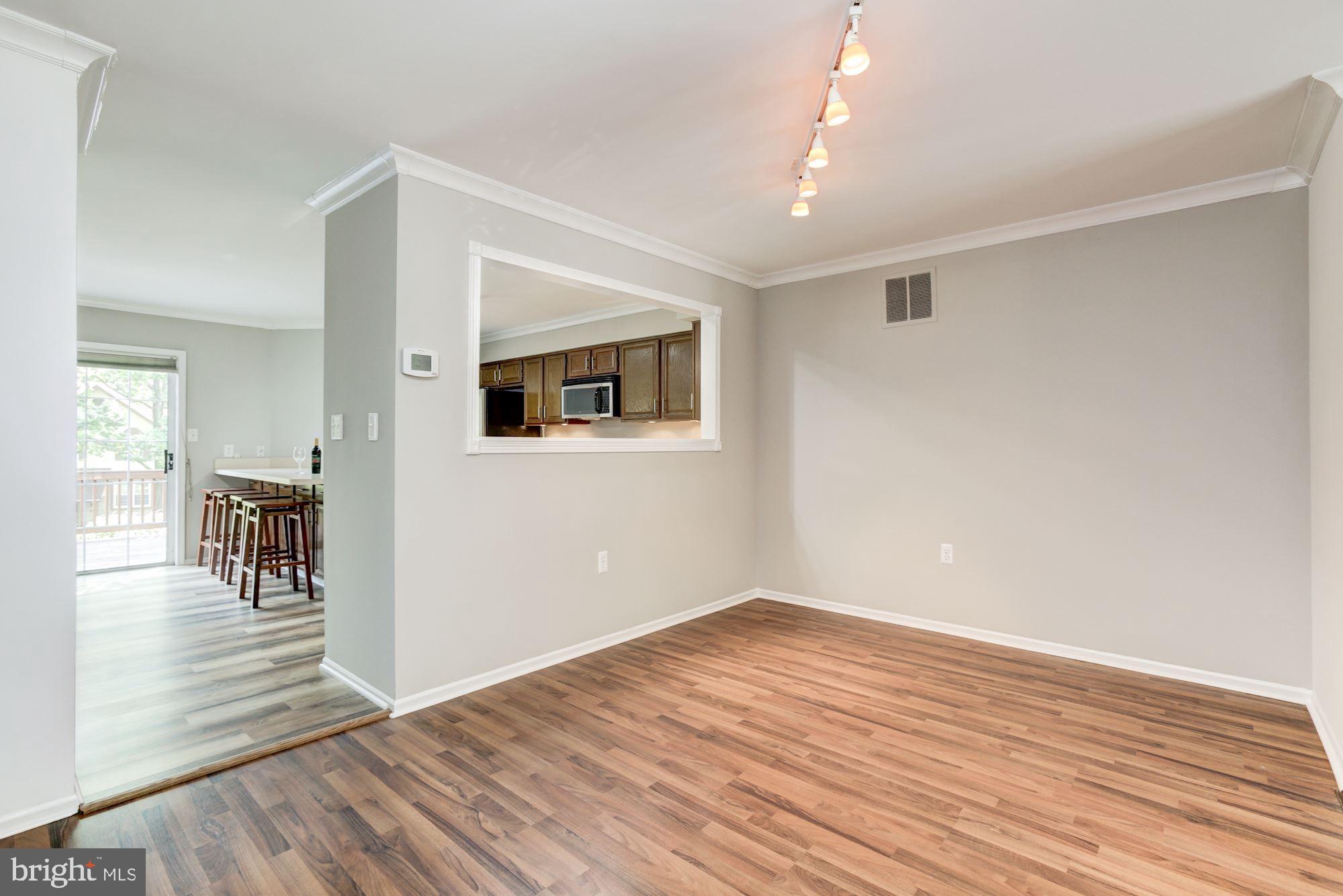 7531 Swan Point Way, Unit 192 Columbia, MD 21045 - Photo 7 of 35 Dining room next to kitchen