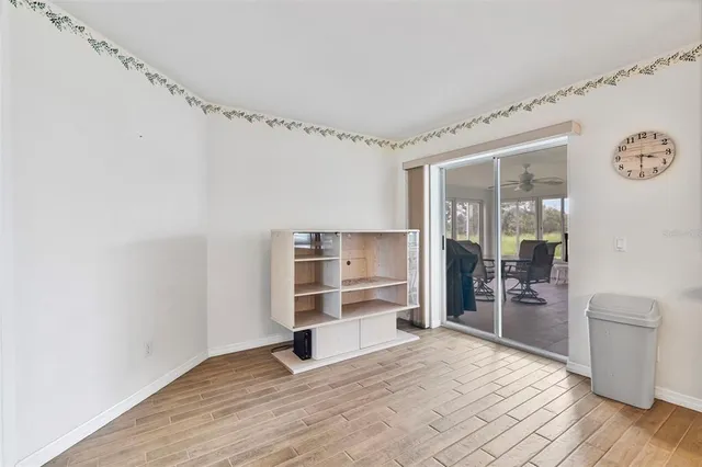 a view of a kitchen with a sink and a window