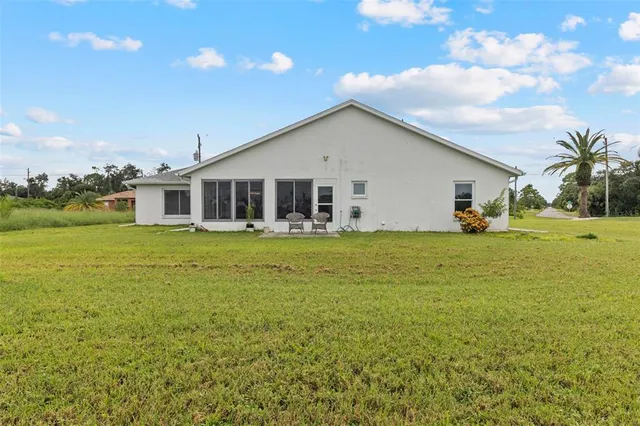 a view of a house with a big yard