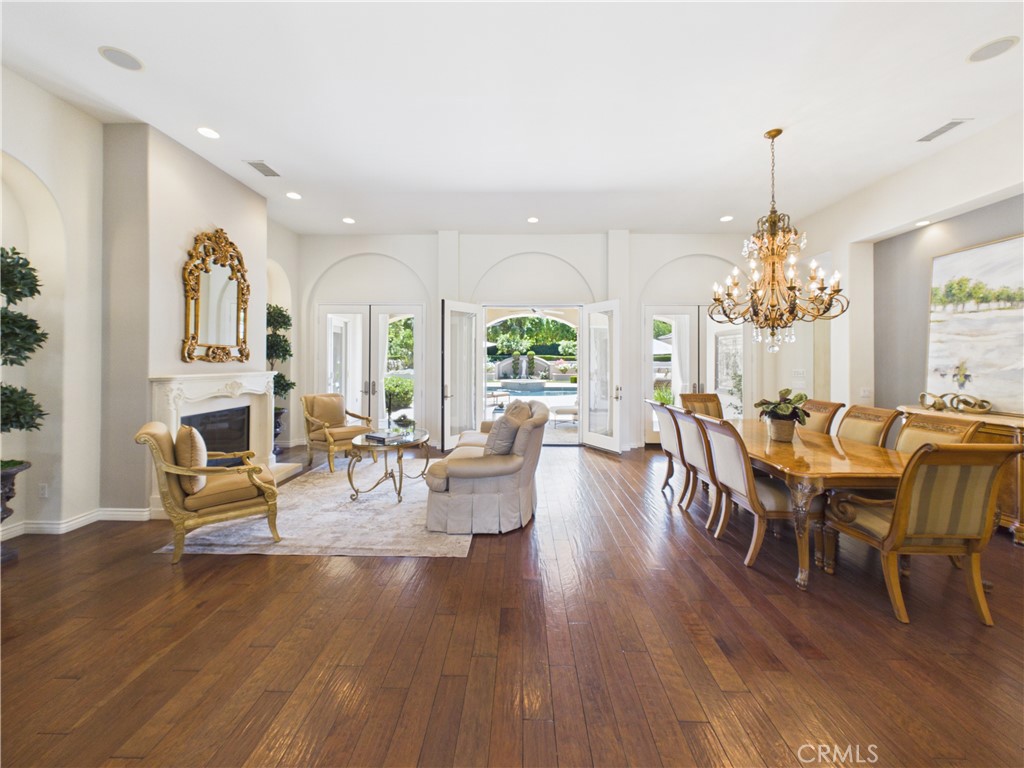 1662 Cherokee Road Corona, CA 92881 - Photo 8 of 60 a view of a dining room with furniture window and wooden floor