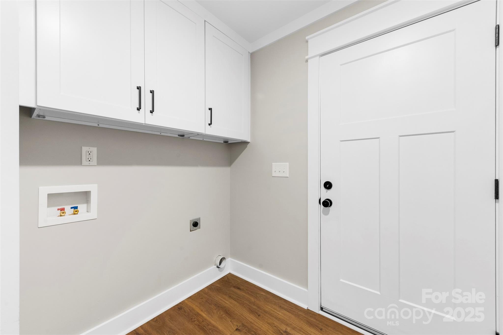6788 Clyde Wehunt Road Cherryville, NC 28021 - Photo 12 of 25 a view of a kitchen with wooden floor