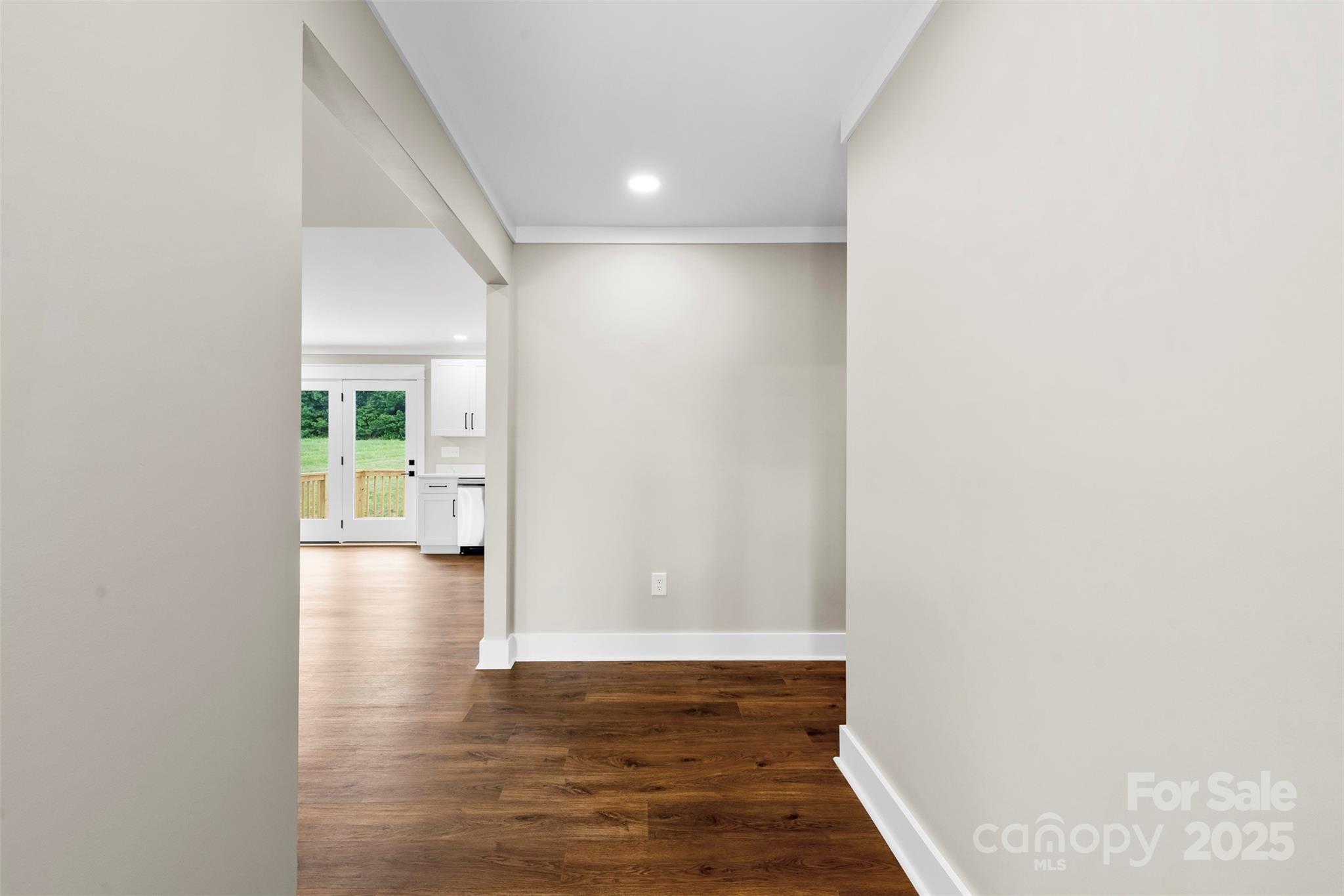 6788 Clyde Wehunt Road Cherryville, NC 28021 - Photo 14 of 25 a view of a hallway with wooden floor