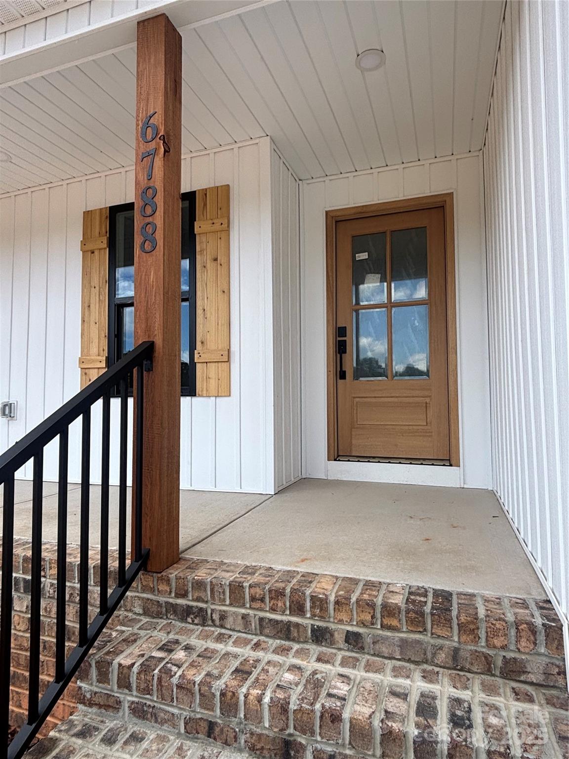 6788 Clyde Wehunt Road Cherryville, NC 28021 - Photo 2 of 25 a view of a front door of a house