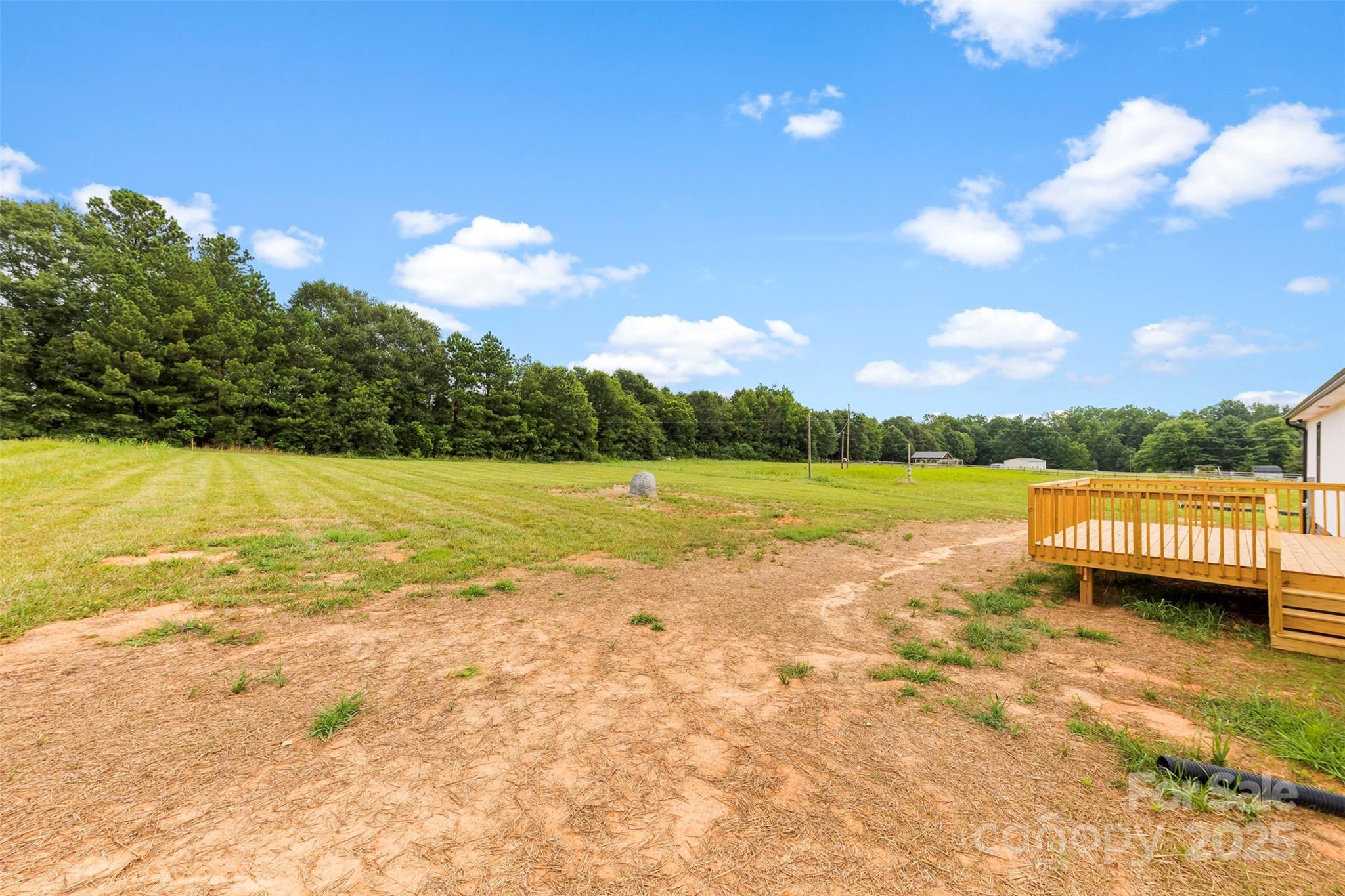 6788 Clyde Wehunt Road Cherryville, NC 28021 - Photo 22 of 25 a view of a lake with couches in the patio